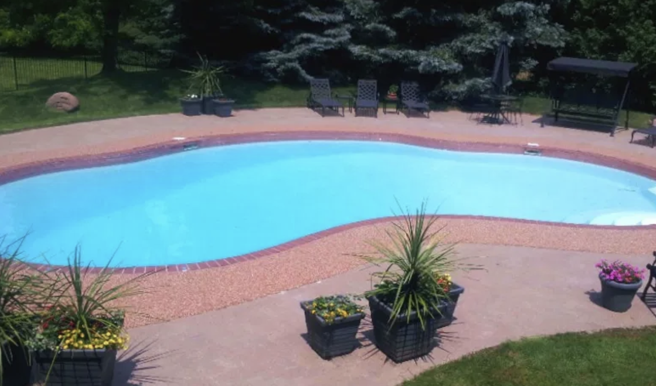 Slip-resistant pool deck resurfacing with Rubber Stone in Metro Atlanta